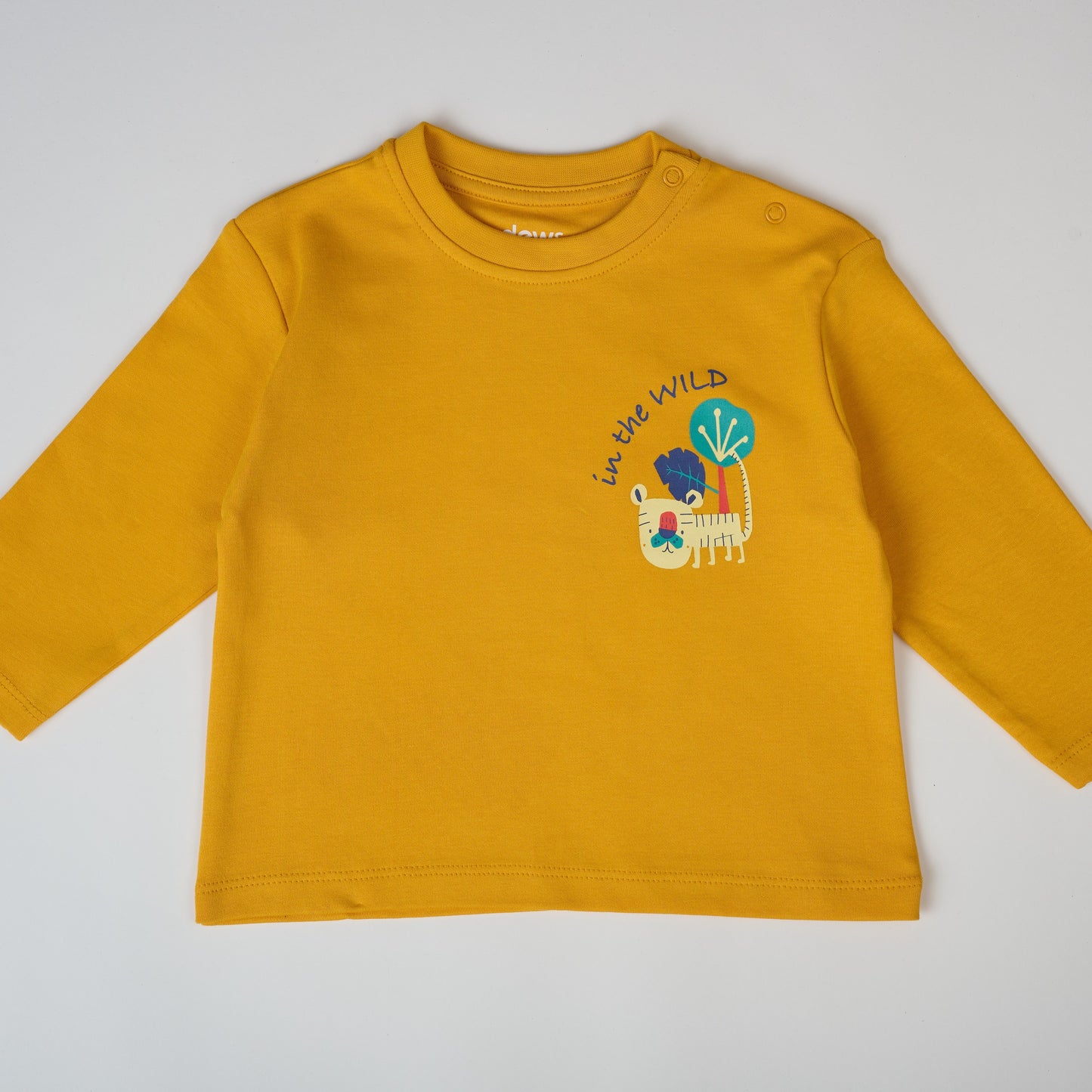 Yellow long-sleeve shirt with a graphic design on a white background