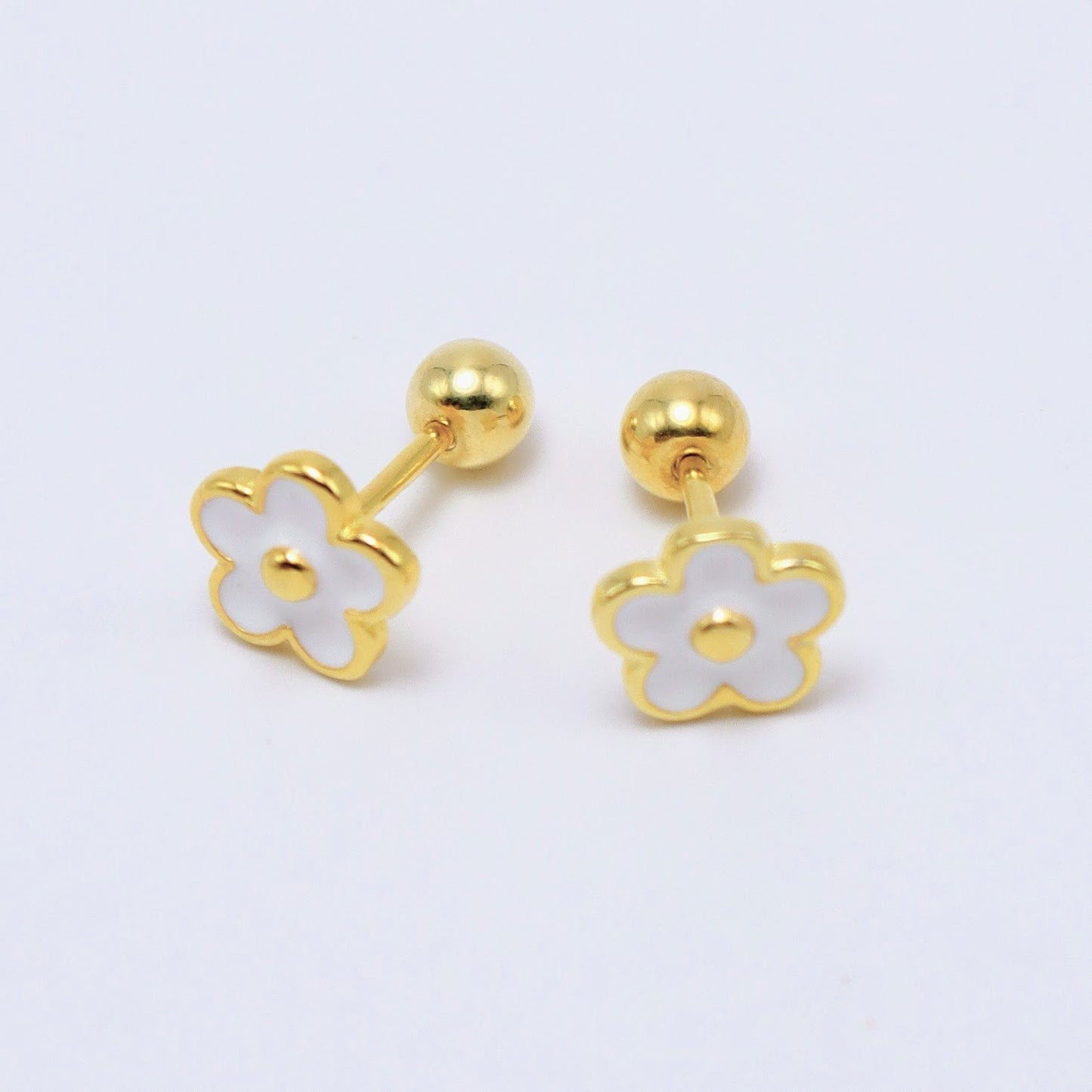 Flower earrings in 14K gold-plated sterling silver with dainty white enamel flower design, ideal for kids.