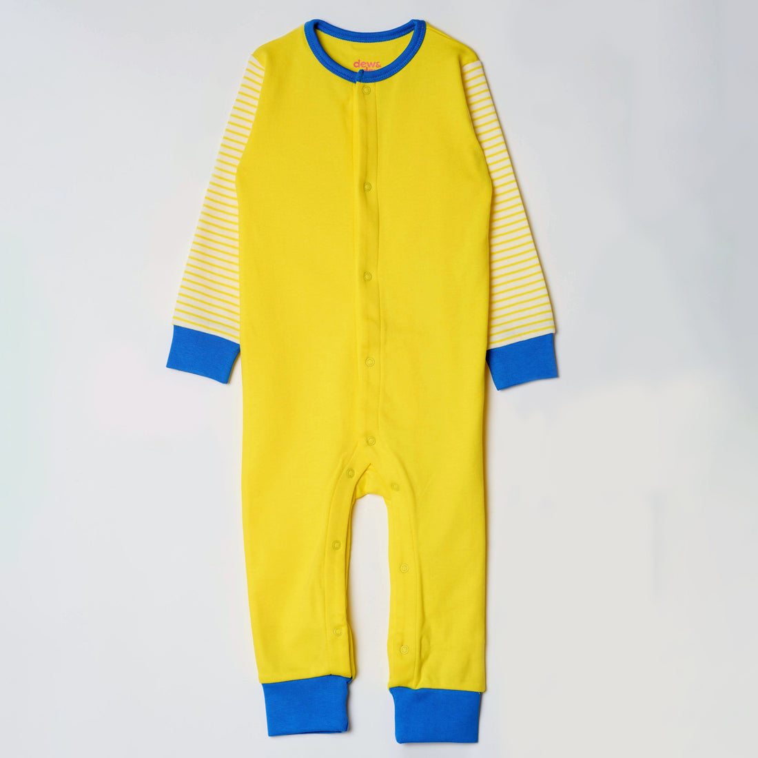 Baby wearing organic cotton snap romper by Dew and Dove