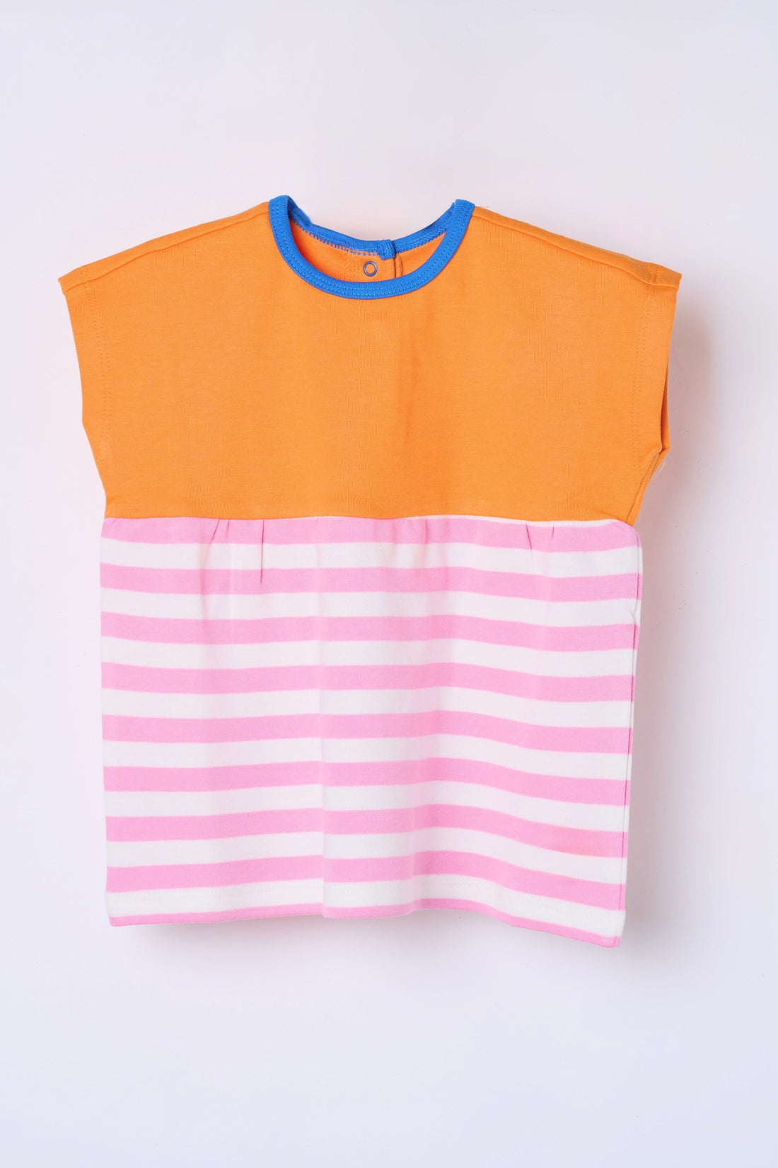 Child in organic cotton tunic Dew and Dove wardrobe essentials