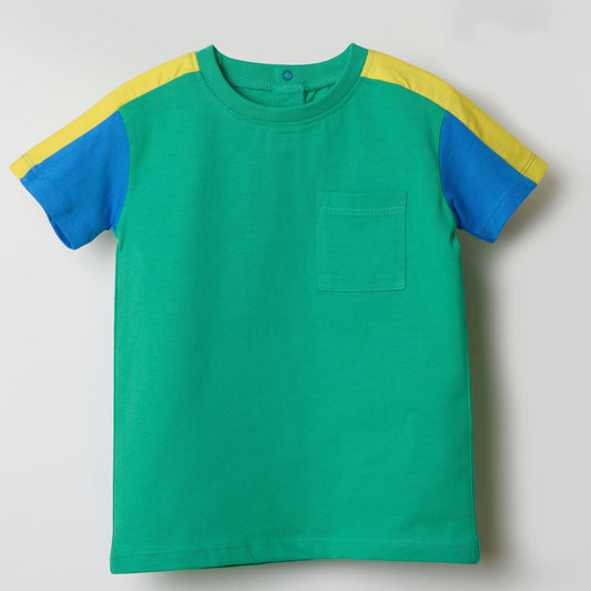 Child wearing GOTS certified organic cotton t-shirt by Dew and Dove