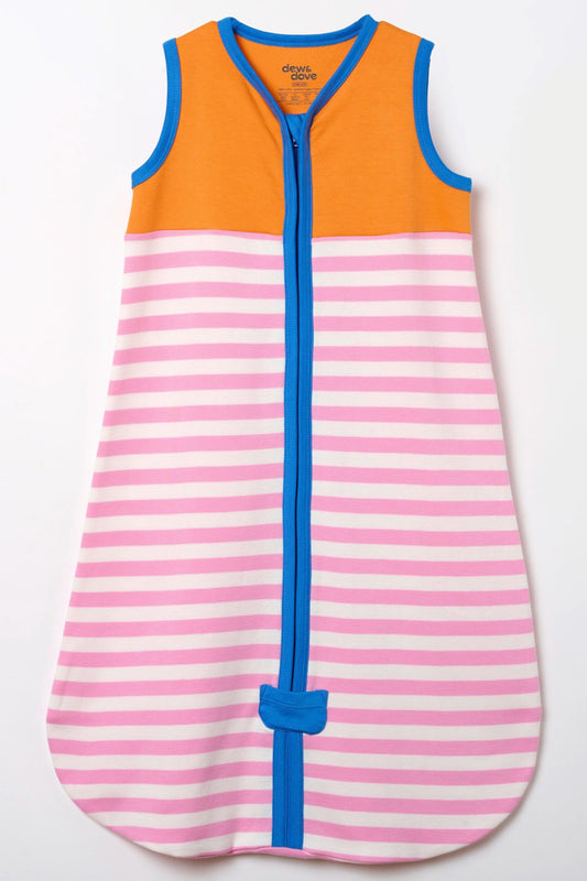 Baby in organic cotton sleep sack by Dew and Dove