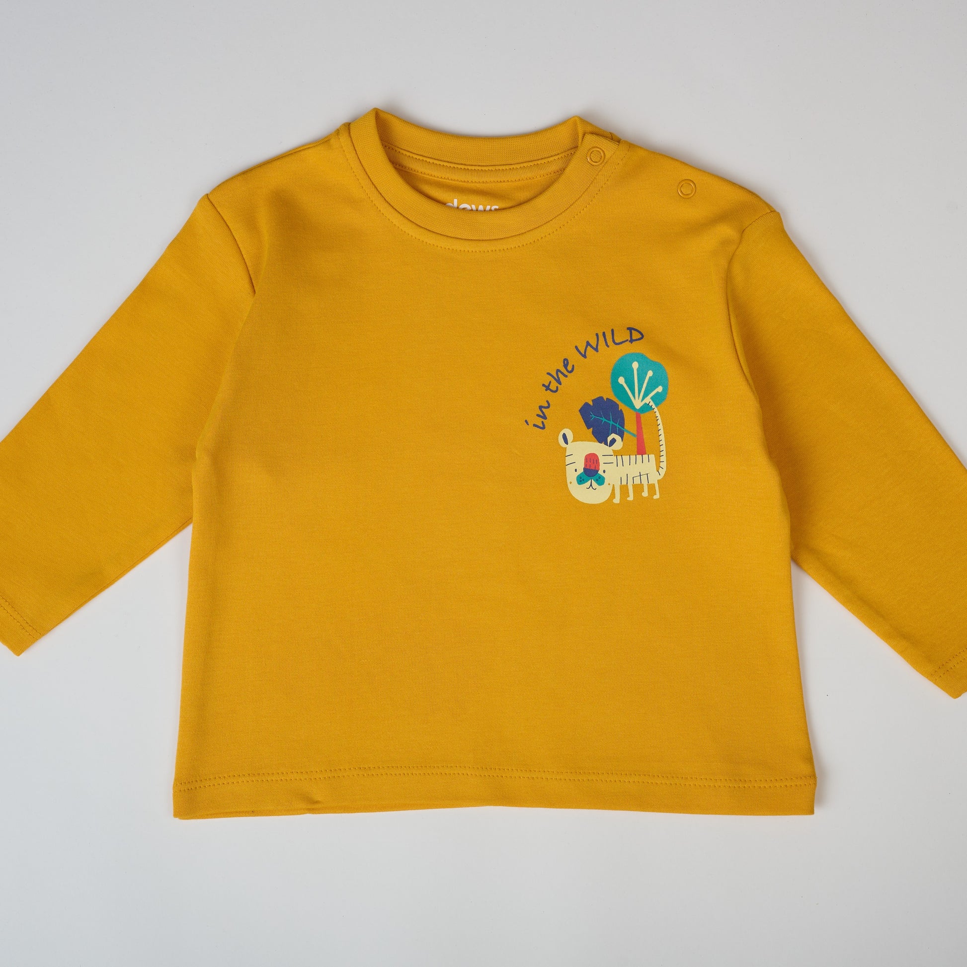 Yellow long-sleeve shirt with a graphic design on a white background