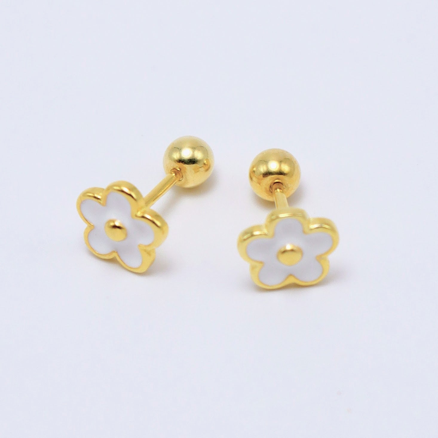 Flower earrings in 14K gold-plated sterling silver with dainty white enamel flower design, ideal for kids.