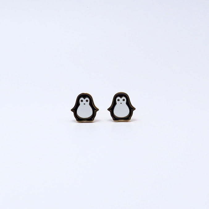 Cute penguin-shaped gold-plated earrings for kids, hypoallergenic and secure, perfect for little ears.