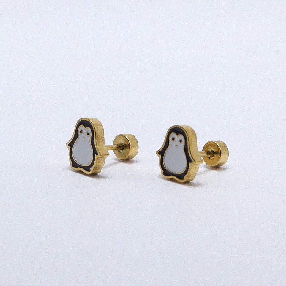 Delicate gold-plated earrings featuring cute penguin design, hypoallergenic and perfect for kids.