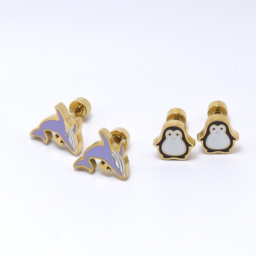 Gold-plated earrings featuring playful dolphin and penguin designs, hypoallergenic and perfect for kids.