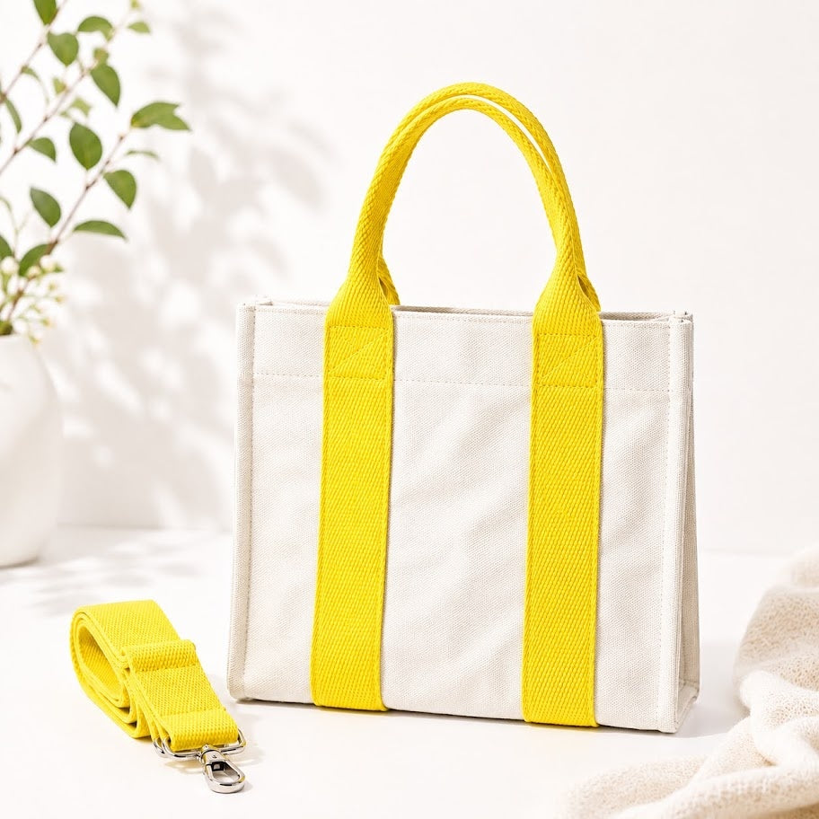Dew & Dove cotton canvas tote bag with yellow straps and detachable shoulder strap