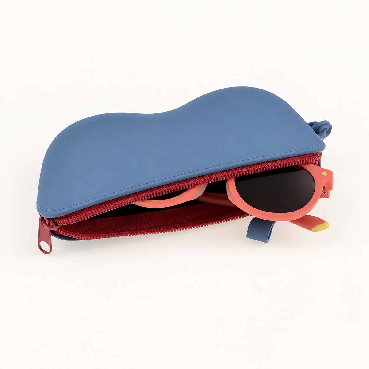 Orange kids round sunglasses stored in zip pouch